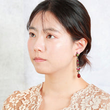 画像をギャラリービューアに読み込む, パープルとカーキグリーンを組み合わせたビジューイヤリング