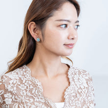 Load image into Gallery viewer, 淡い水色の薔薇モチーフのボヘミアングラスをあしらったイヤリング