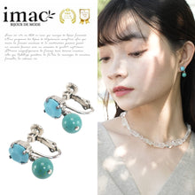 Load image into Gallery viewer, 鮮やかなブルーのターコイズとスワロフスキークリスタルの組み合わせが上品なイヤリング