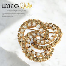 画像をギャラリービューアに読み込む, ラインストーンを贅沢にあしらった、立体的なデザインのブローチ