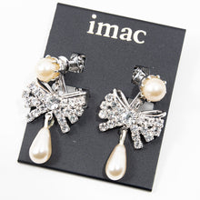 Load image into Gallery viewer, イヤリング ラインストーン パール クリアカラー ホワイト リボン 136164