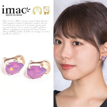 Load image into Gallery viewer, 大粒のラインストーンが美しく輝く紫色のイヤリング