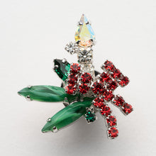 画像をギャラリービューアに読み込む, ヒイラギの上に置かれたろうそくをイメージしたビジューバッジ