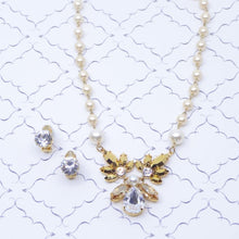 Load image into Gallery viewer, シャープなカッティングが美しいビジューイヤリング